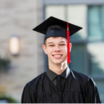 this image is of a male student with a graduation cap and gown